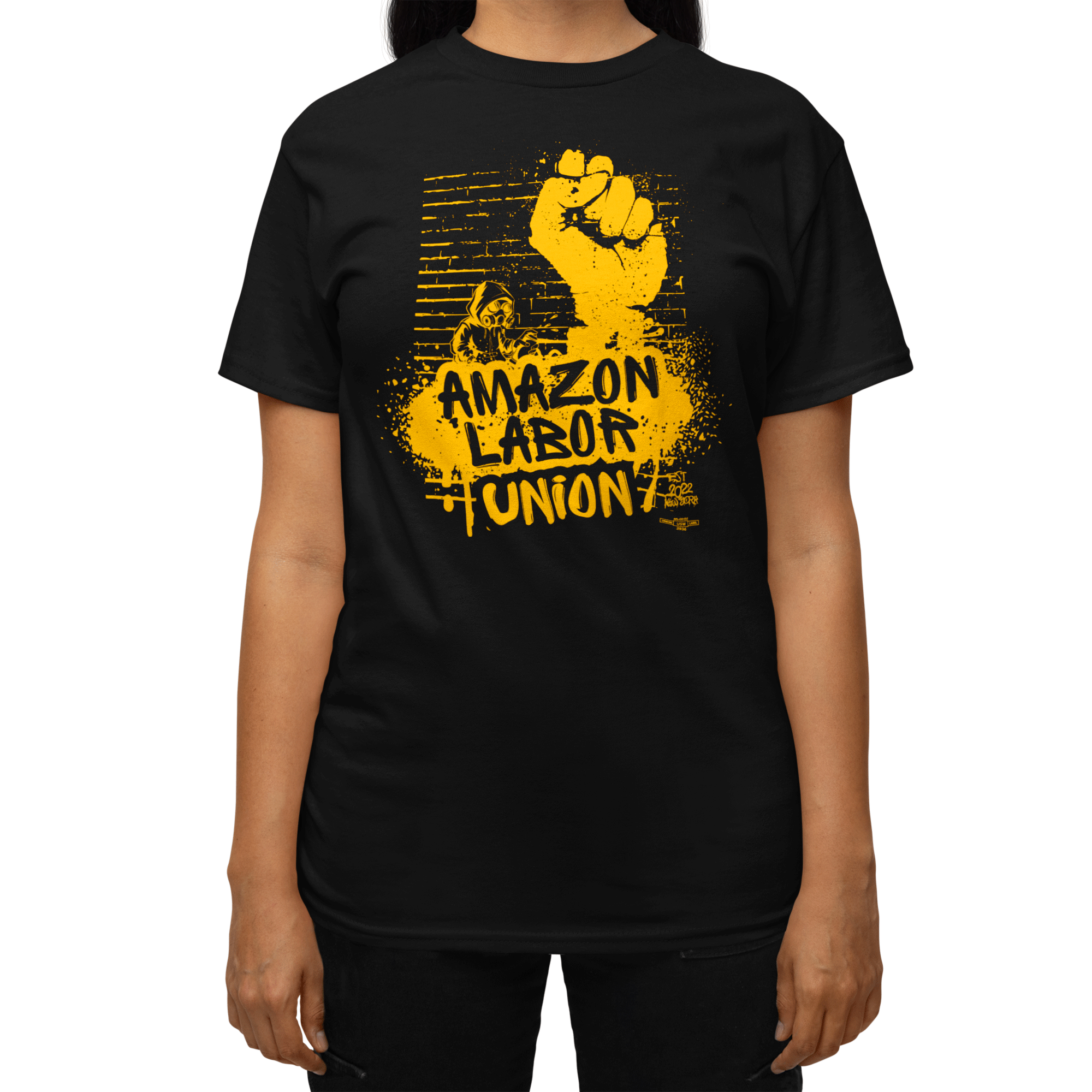 Black t-shirt with yellow graphic and text 'Amazon Labor Union' worn by a person