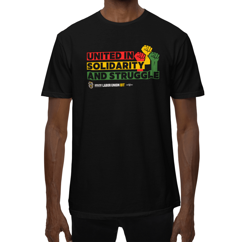 Black t-shirt with 'United in Solidarity and Struggle' text and fist graphic on a white background