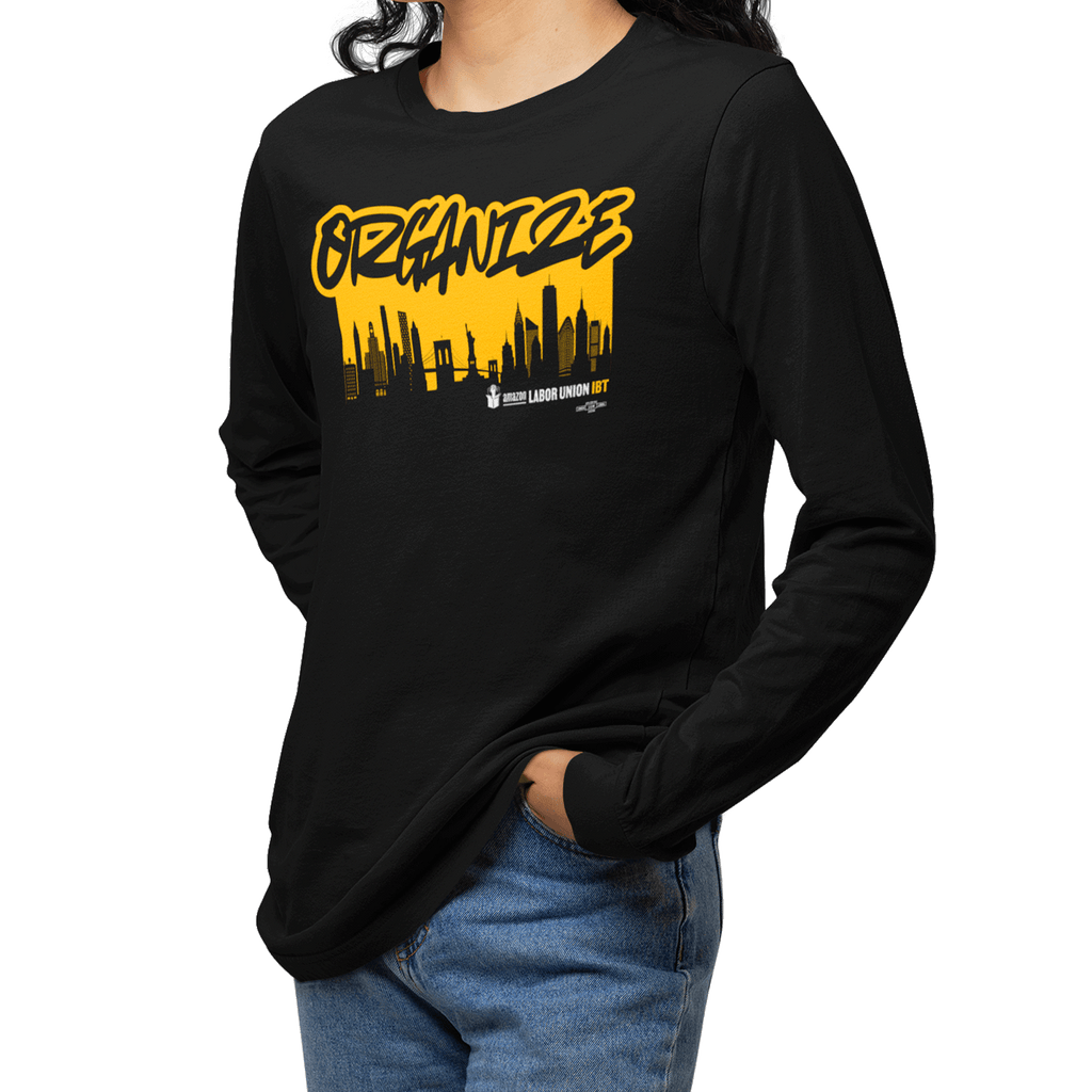 Black long-sleeve shirt with yellow graphic design on a white background