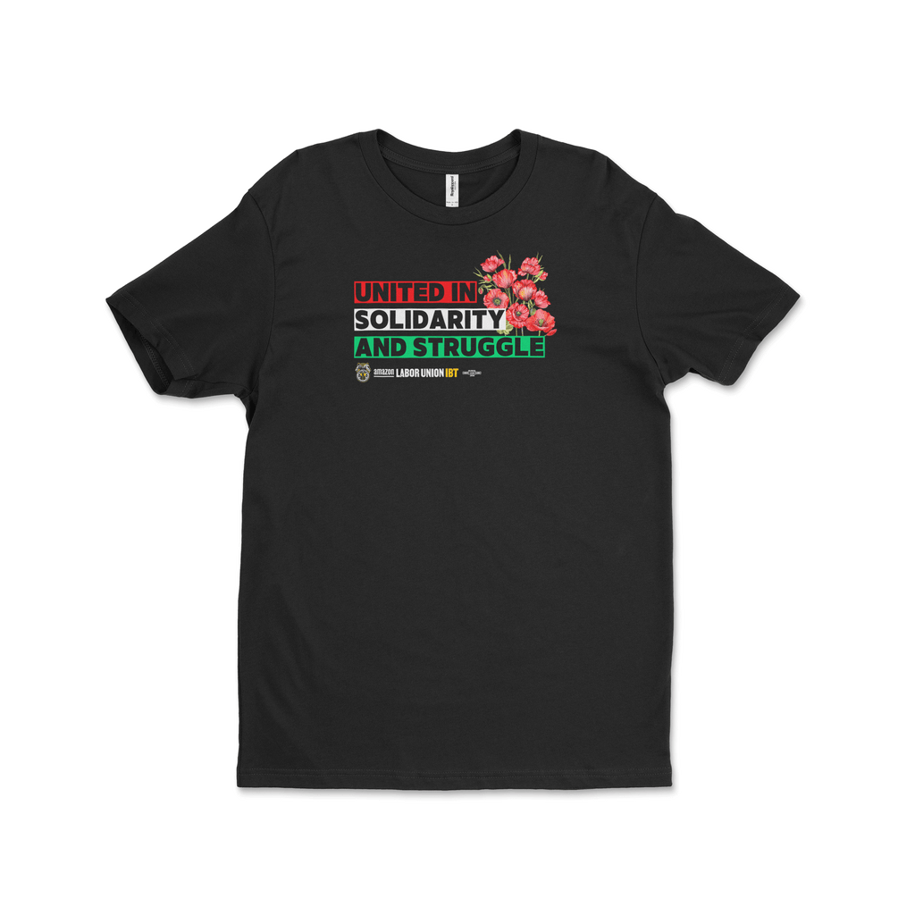 Black t-shirt with colorful text and graphics on a white background