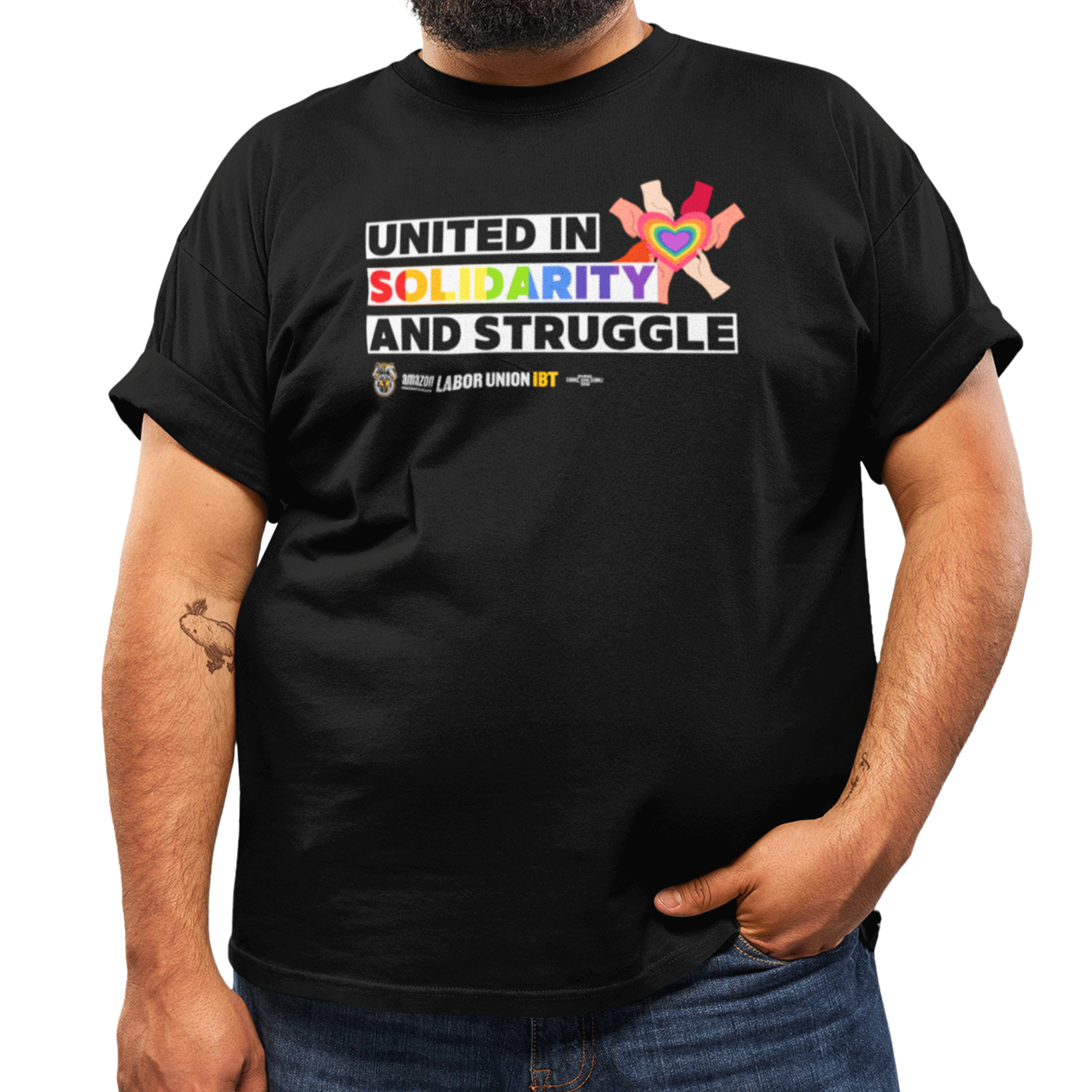 Person wearing a black t-shirt with colorful text and graphics on a white background