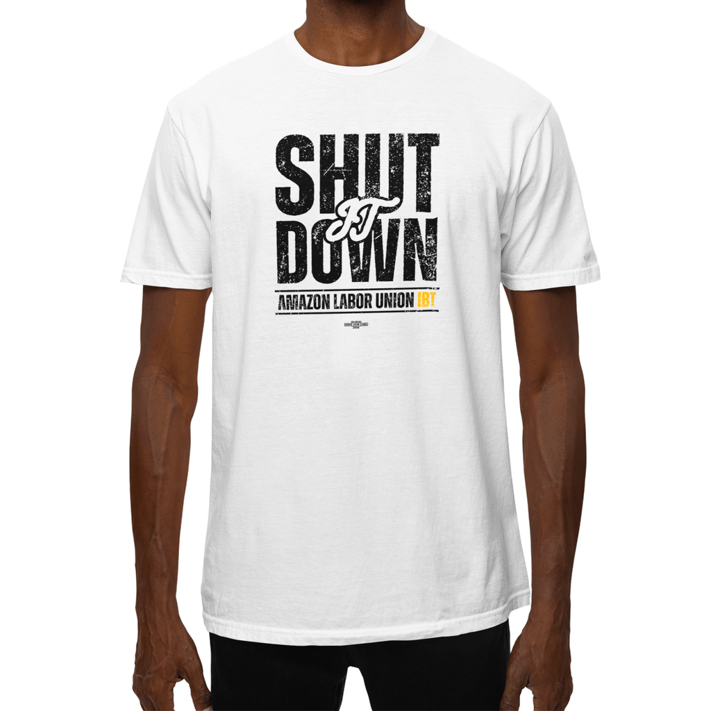 White t-shirt with 'SHUT IT DOWN' text worn by a person on a white background