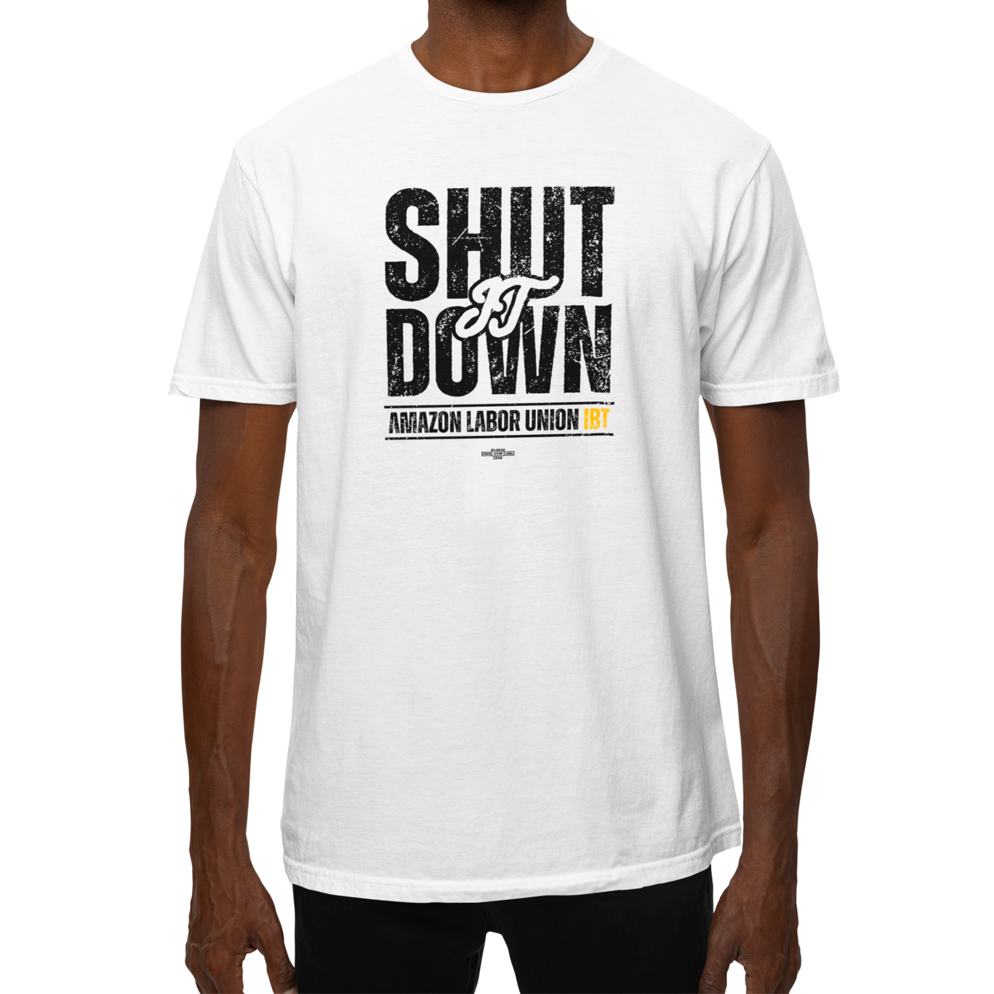 White t-shirt with 'SHUT IT DOWN' text worn by a person on a white background